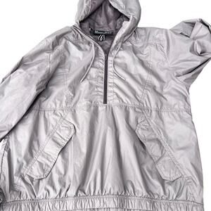 Under Armour Storm, Loose Fit lightweight hooded 1/4 zip jacket, women's M-loose